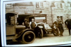 Turners Garage with the top automobiles of the day.